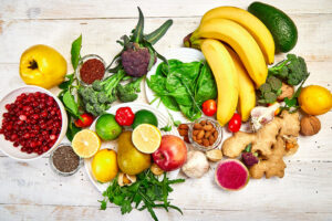 Fruits and vegetables arranged on a wooden table