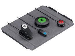 A grey mat with labeled buttons