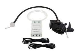 A mounting device with a black tube. A battery pack is in the middle next to two power cords